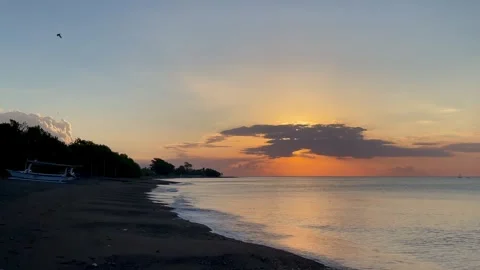 Horizontal Static Shot of Sunset Beach with God Rays in Bali Stock Footage 340411420