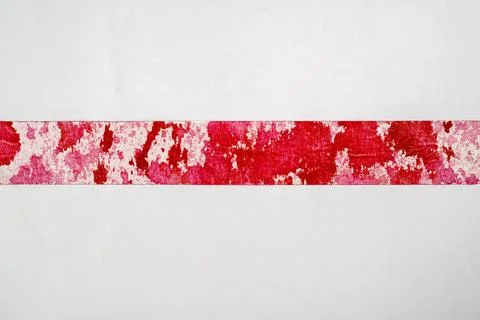 A horizontal strip of patterned red ed paint or blood splatters, drips, and.. Stock Photos