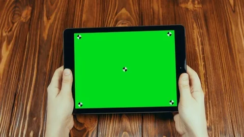 Horizontal Tablet With Green Screen In Hands Stock-Footage 72457531