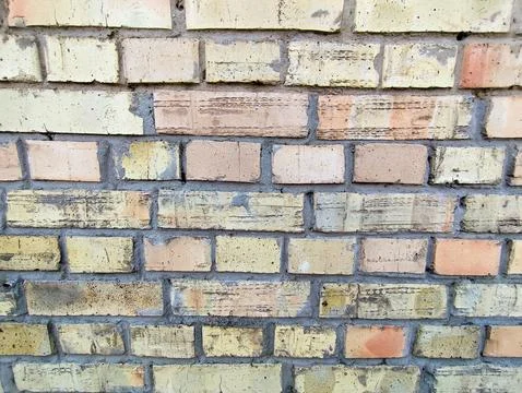 Horizontal Texture of Antique Weathered Brick Wall with Multi-colored Blocks Stock Photos
