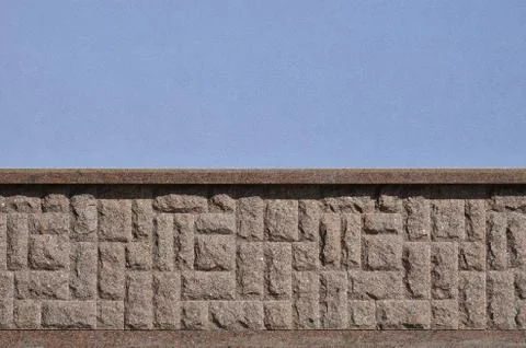 Horizontal texture of coarse and strong mosaic granite stone foundation Stock Photos