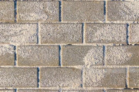 Horizontal texture of paving slabs made of artificial stone or concrete sprin Stock Photos