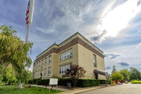 A horizontal three quarter view of the brick Suffern Municipal Building Stock Photos