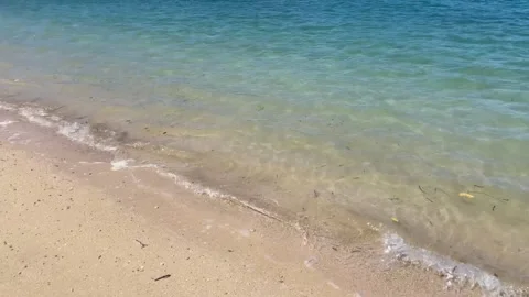Horizontal Tilt Up Turquoise Beach and Mountains Bali Stock Footage 335916121