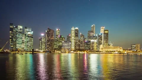 Horizontal Timelapse of Singapore CBD Skyline from Dusk to Night Stock Footage 338319044