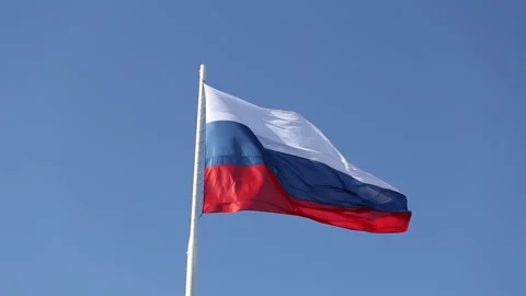 Horizontal video of the Russian flag developing in the wind. Stock Footage 196865903