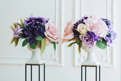 Horizontal view of beautiful artificial flowers in pink and purple colours .. Stock Photos