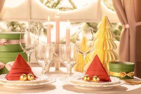Horizontal View Christmas Dining Table Setting for Two with Candles Stock Photos