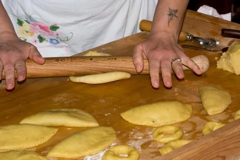 Horizontal View of Close Up on Hands Working the Dough for Preparing Traditio Stock Photos