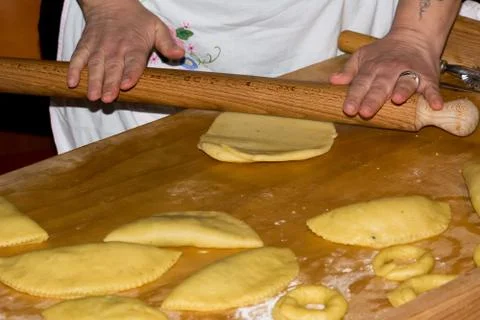 Horizontal View of Close Up on Hands Working the Dough for Preparing Traditio Stock Photos
