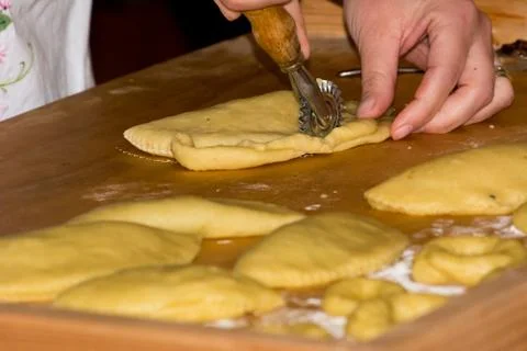 Horizontal View of Close Up on Hands Working the Dough for Preparing Traditio Stock Photos