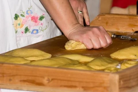 Horizontal View of Close Up on Hands Working the Dough for Preparing Traditio Stock Photos