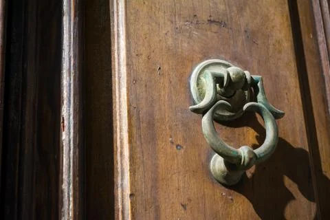 Horizontal View of Close Up of an Old Clapper on a Wooden Door. Bari, South o Stock Photos