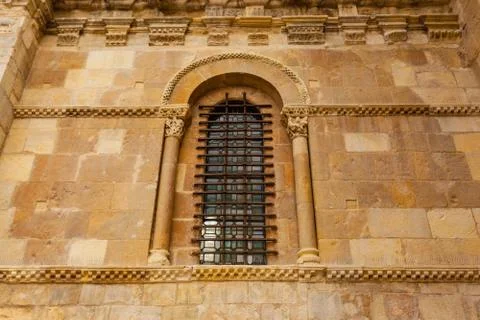 Horizontal view of exquisite romanesque window in san isidoro church Stock Photos