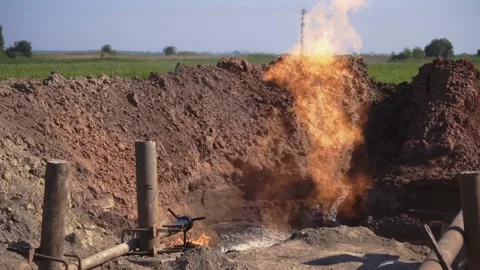 Horizontal view of fire and tubes in oil refinery and gas processing plant Stock Footage 213671123