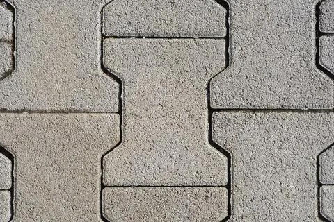 Horizontal View of Grey Concrete Interlocking Paving Stones Stock Photos