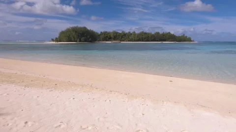 Horizontal view left to right of look out from Muri Beach Cook Islands to Koromi Stock Footage 235307640