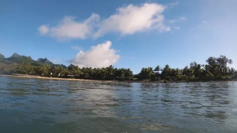 Horizontal view of look out to pacific Cook islands from Avana harbor passage to Stock Footage 261980634