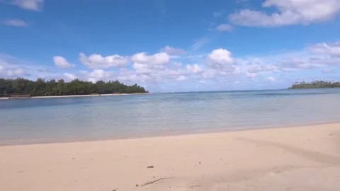 Horizontal view right to left of look out from Muri Beach Cook Islands to Koromi Stock Footage 235307688