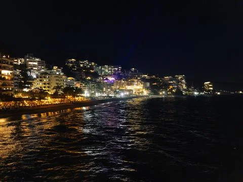 Horizontal view of the romantic zone seen from the water in Puerto Vallarta.. Stock Photos