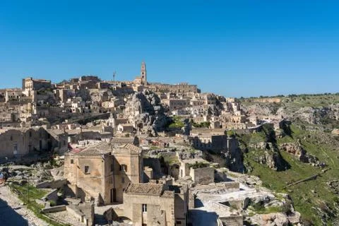 Horizontal View of the Sassi of Matera on Blue Sky Background. Matera, South Stock Photos