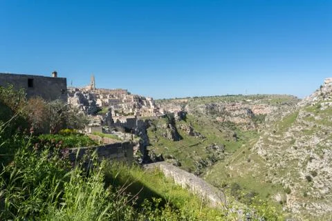 Horizontal View of the Sassi of Matera on Blue Sky Background. Matera, South 스톡 사진