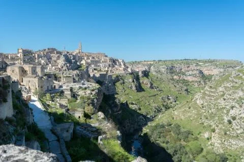 Horizontal View of the Sassi of Matera on Blue Sky Background. Matera, South Stock Photos