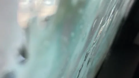 Horizontal view of side car mirror covered in suds Stock-Footage 332412681