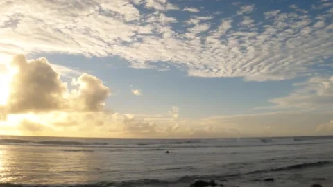 Horizontal view of sunset at black rock of north east Cook Islands look out to t Stock Footage 235307146