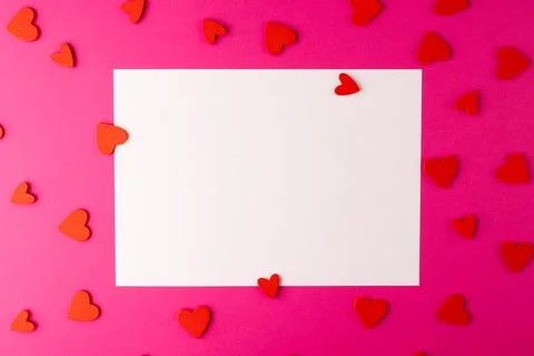 Horizontal white rectangular copy space with red heart shapes on pink background Stock Photos