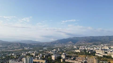 Horizontal wide angle aerial view of Tbilisi city residential districts wit.. Stock Photos