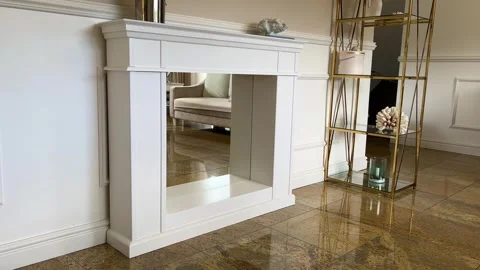 Horizontal wide view of modern handcrafted white wooden fireplace mantle 스톡 동영상 342953489