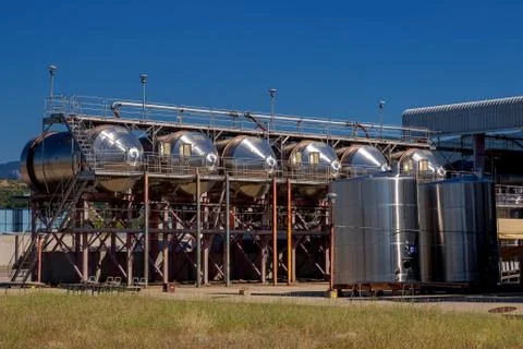 Horizontal winemaking tanks. Stock Photos