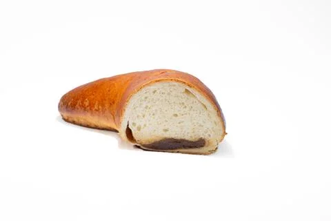 Horn with jam in section on a white background. Horn bun from Berdyansk bakery Stock Photos