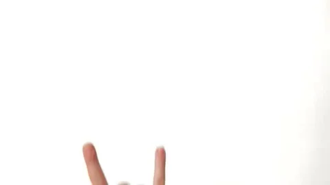 Horns Hand Gesture on white background Stock Footage 98248162