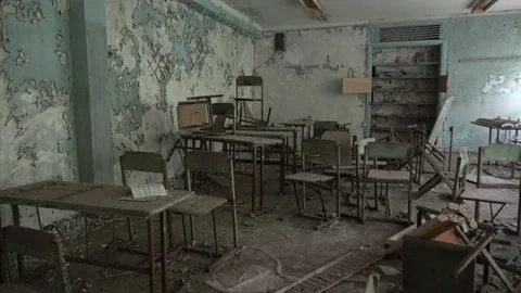 Horrible view on what is left from a classroom in abandoned school Stock Footage 114680635