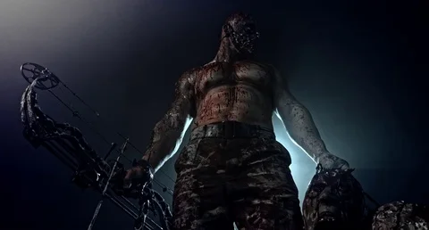 Horrific zombie killer with a crossbow. 스톡 동영상 70935189