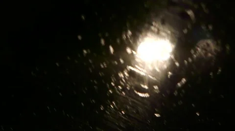 Horrifying POV, car driver in heavy rainy night at road with focus on windscreen Stock Footage