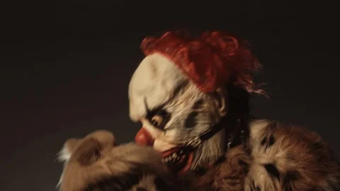 Horror clown with a dog. Stock Footage 100691126