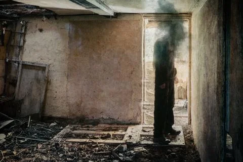 A horror concept. Of a figure with no face standing in the doorway Ilustración de archivo