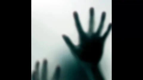 Horror Concept Silhouette of Spooky Hands Pressing Against Frosted Glass Stock Footage 322746264