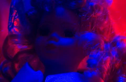 Horror doll blue &amp; red light. Foto stock