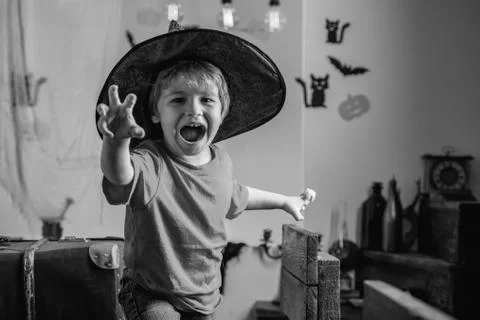 Horror face. Secrets of Magic for Happy Halloween. Halloween kids party and Stock Photos