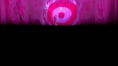 Horror figure in glowing light performing creepy ritual scene in haunted room 스톡 동영상 321608491