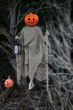 Horror pumpkin with a scythe Foto stock