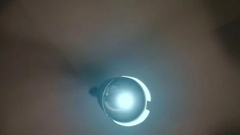 Horror scene created with dim lamp light, smoke and tense atmosphere, concept of 動画素材 345501405