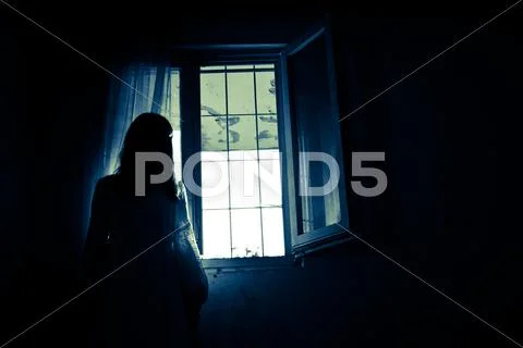 Horror scene of a creepy woman in the wedding dress Stock Photos