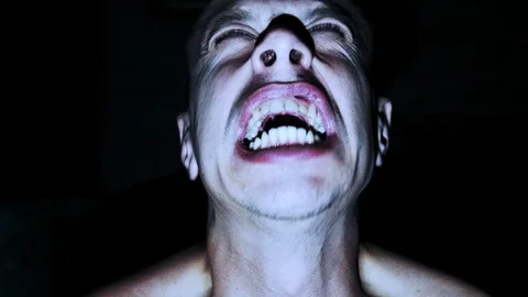 Horror scene screaming man face. | Stock Video | Pond5