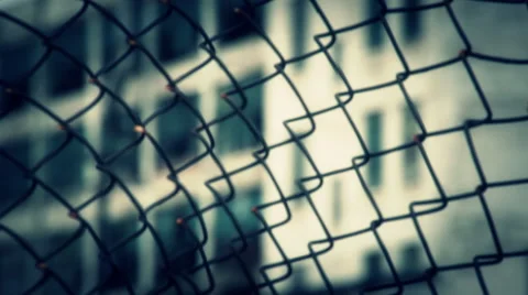Horror Scene Stock Elements: Rack Focus Fence/Abandon Building Stock Footage 55202810