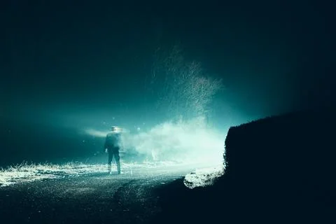A horror, sci fi concept. Of a man vanishing into smoke Stock Photos